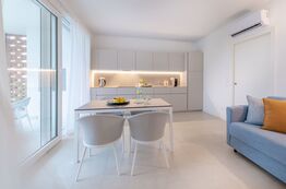 Vollausgestattet Küchen und ein einladender Wohn- und Essbereich bilden das Herzstück des Apartments